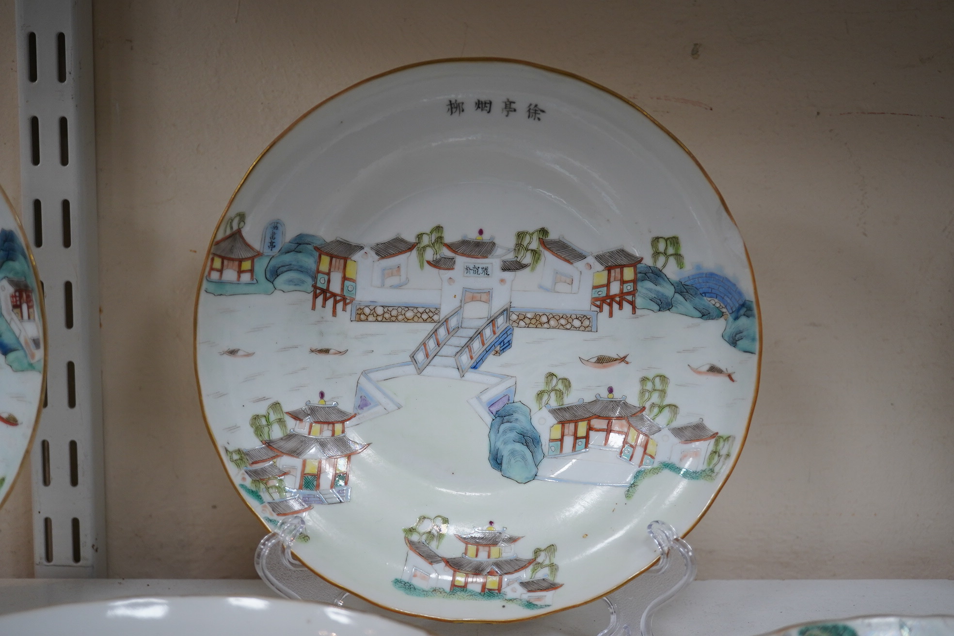 A set of five Chinese enamelled porcelain ‘pavilion’ dishes, Daoguang mark and period (1821-50)